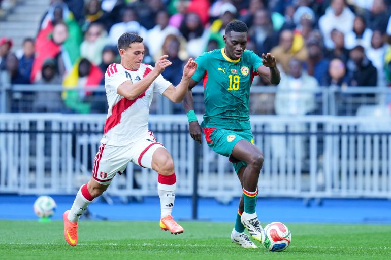 Senegal's coach confidently pledges a World Cup win with the national team.